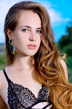 The Green-eyed Russian Beauty Is So Seductive As She Turns To Show How The Garterbelt Frames Her Hot Ass.