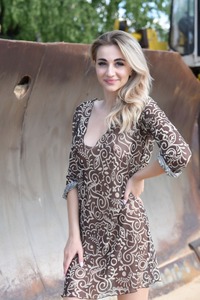 Ava List Seduces Outdoors In A Short Dress And Red Nails Teasing With Breast Holding