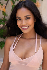 Putri Cinta Offering Teasing Glimpses Of The Skimpy Bikini That Barely Contains Her Lovely Big Breasts