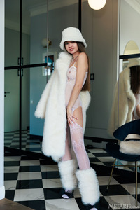 Georgia Gorgeous Blue Eyes Sparkle Flirtatiously As She Lets Her Coat Fall Open To Reveal Her Perfect Body