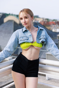 Polly Yangs Brandishing Her Favorite Toy With A Look