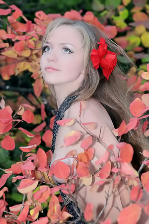 Hottie plays with fresh flowers