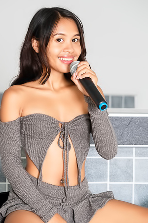 Namy Asian Dressed In A Skimpy Two-piece Ensemble But It’s Not Long Before She’s Wearing Nothing But Her High Heels