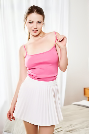 Toree Flipping Up For A Tempting Rear View Of Her Sexy Booty In Thong Panties