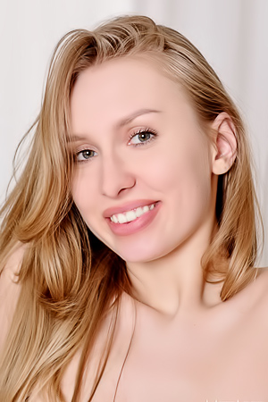 Lia Pink Teases at the Edge of a Chair and Table