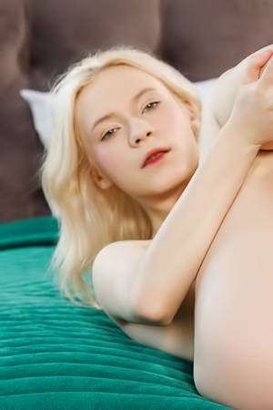 Mara Voss Teases on Silk as Panties Slide Down